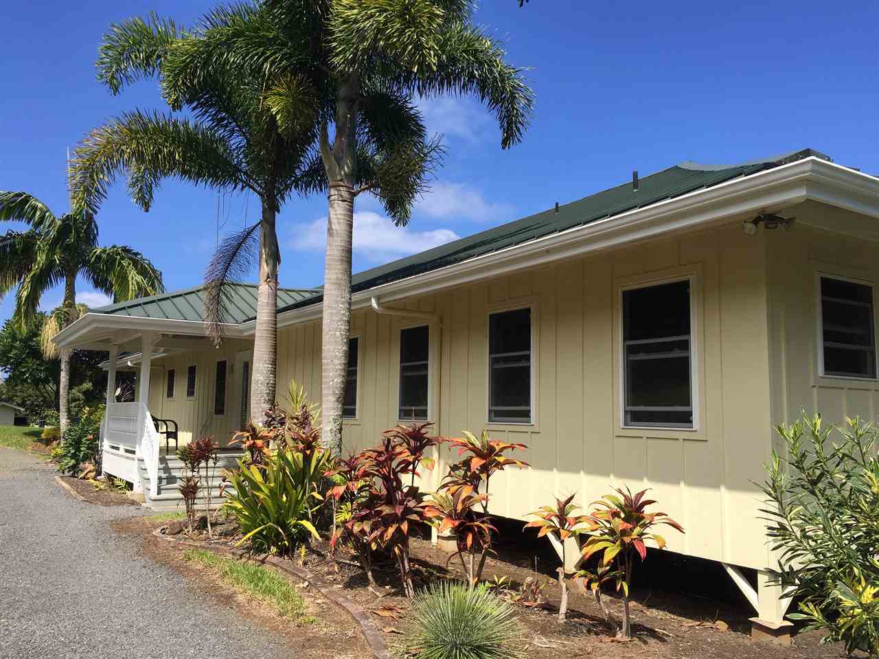 300 Hanauana Road Haiku, HI 96708 - Photo 4 of 30 front view of a house with a table and a chair