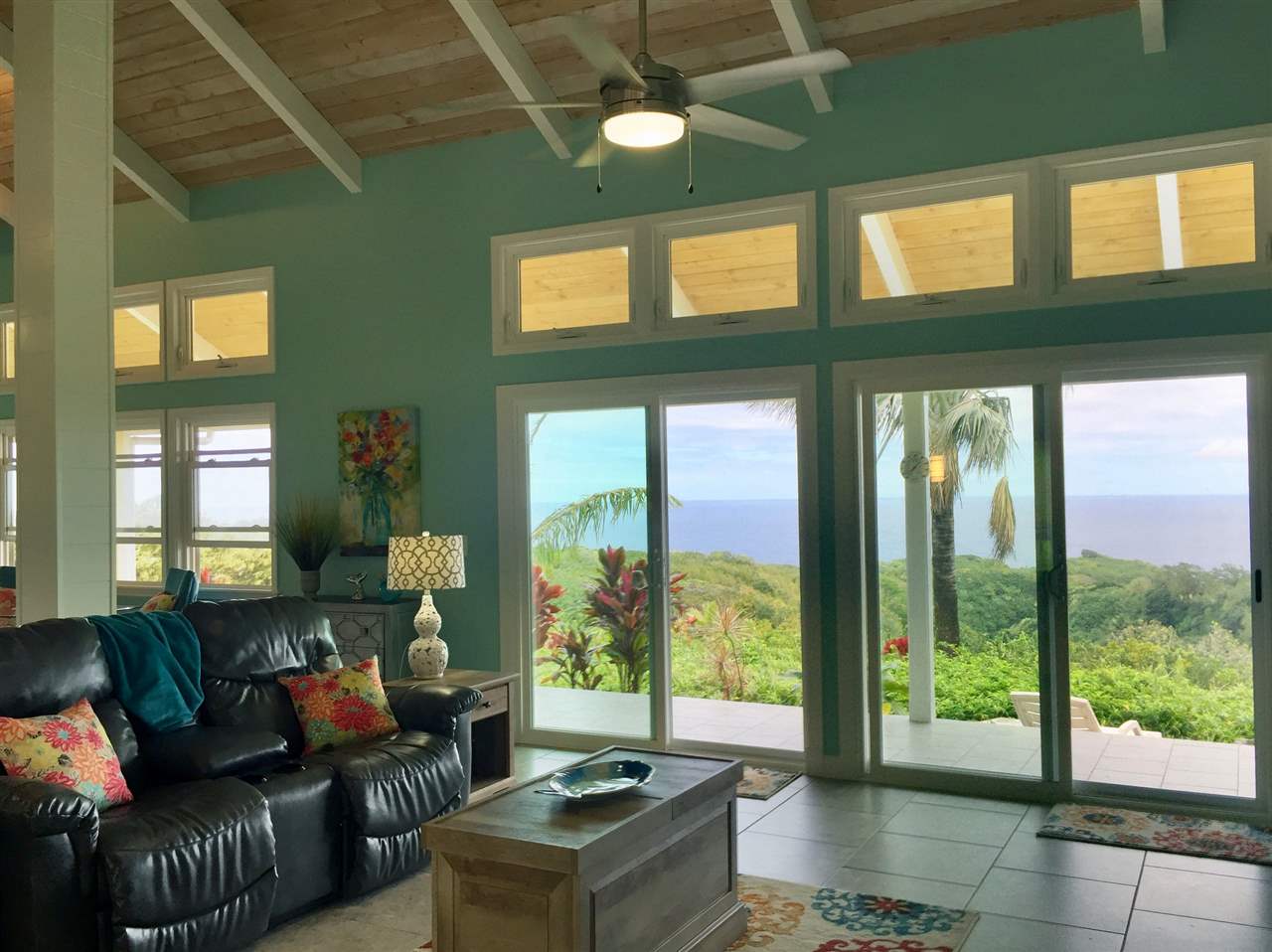 300 Hanauana Road Haiku, HI 96708 - Photo 7 of 30 a living room with furniture and large windows