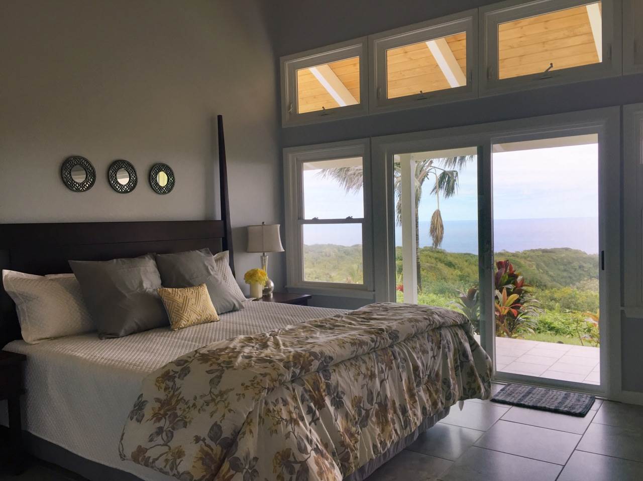 300 Hanauana Road Haiku, HI 96708 - Photo 10 of 30 a bedroom with a bed and window