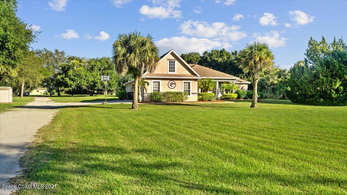 3712 Glenn Road Mims, FL 32754 - Photo 1 of 51 Front Yard (1)