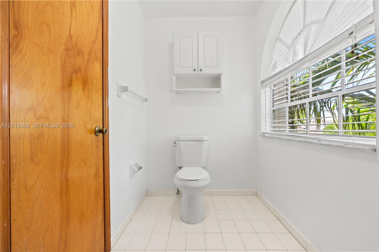15345 Southwest 63rd Terrace Miami, FL 33193 - Photo 10 of 51 a bathroom with a toilet and a shower