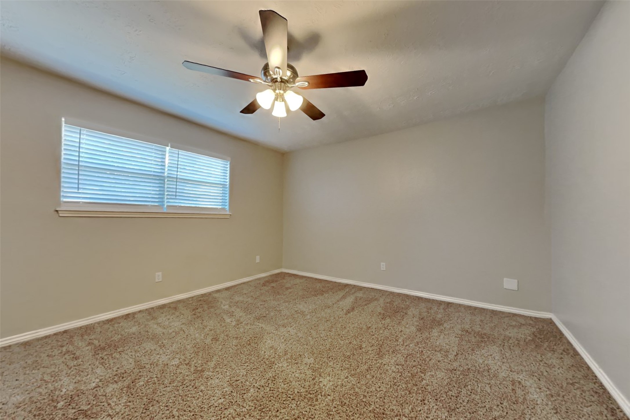 19022 White Candle Drive Spring, TX 77388 - Photo 14 of 22 a view of an empty room with a window