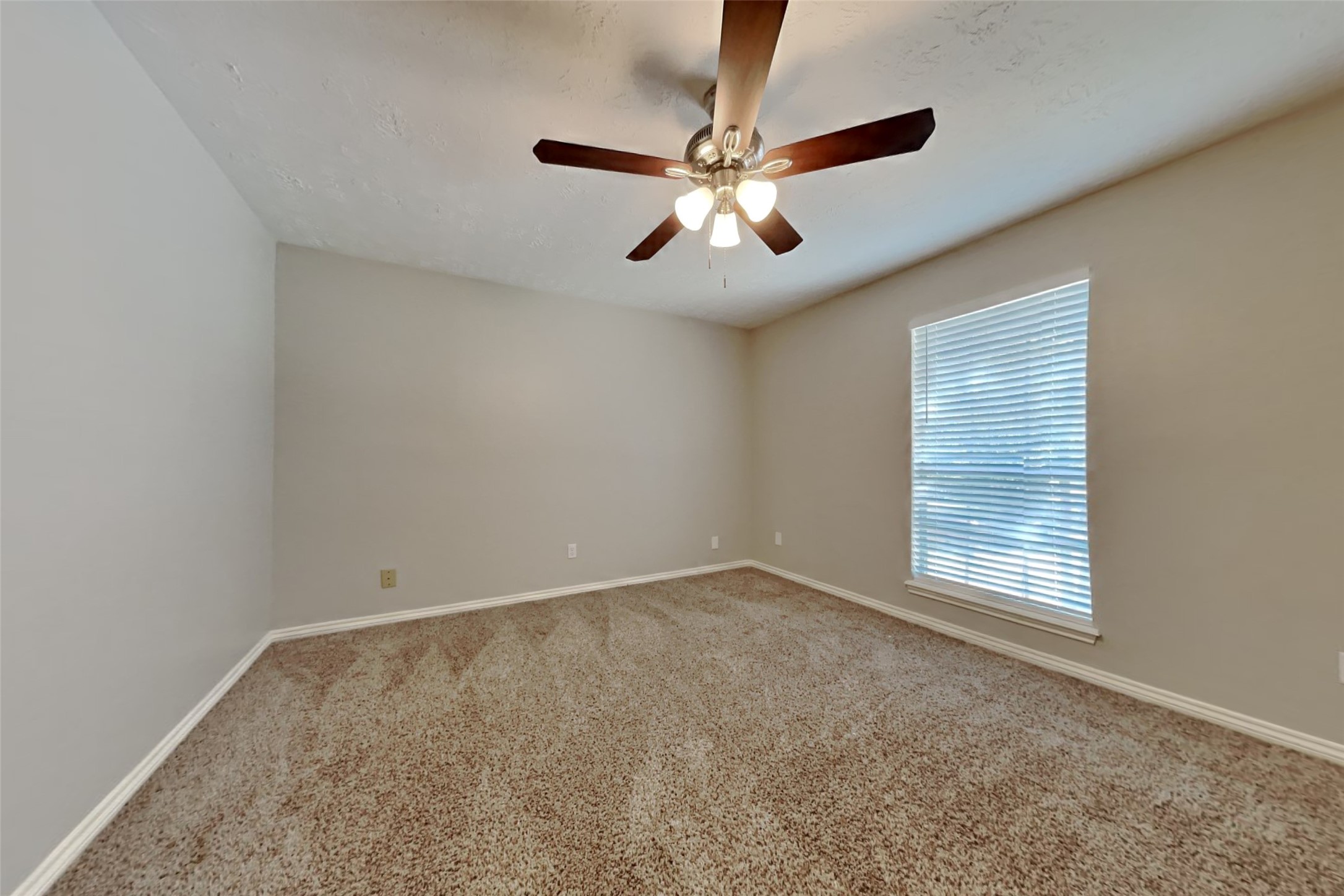 19022 White Candle Drive Spring, TX 77388 - Photo 16 of 22 a view of an empty room with a window
