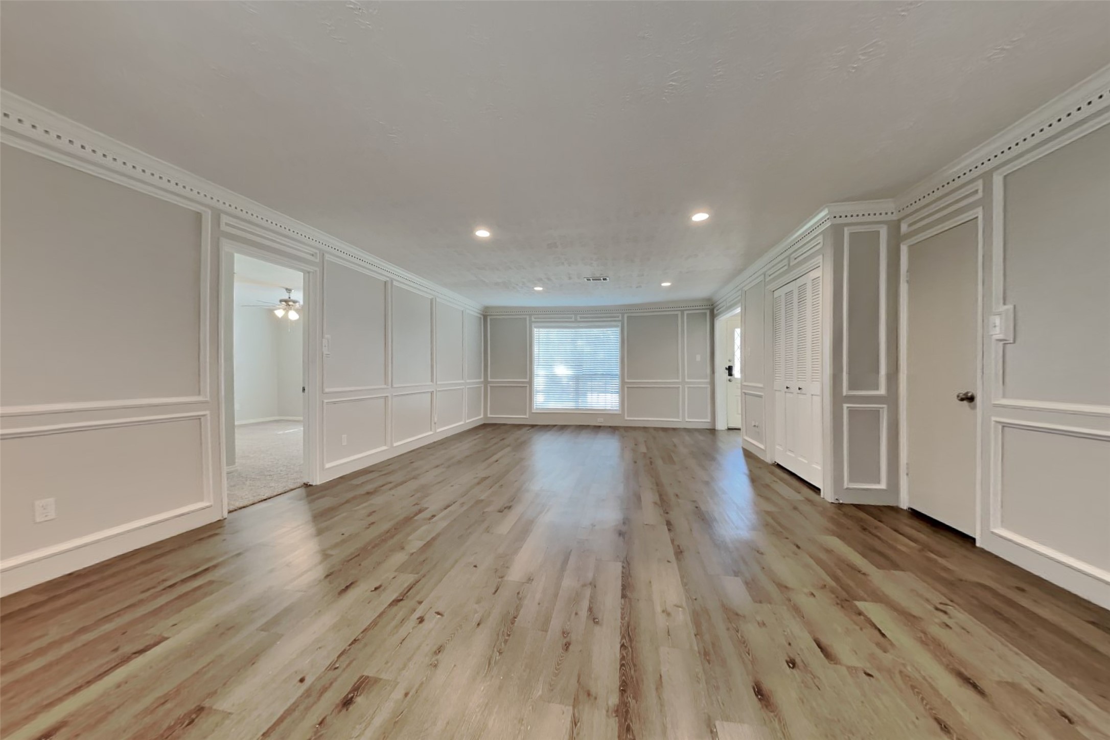 19022 White Candle Drive Spring, TX 77388 - Photo 3 of 22 a view of empty room with wooden floor