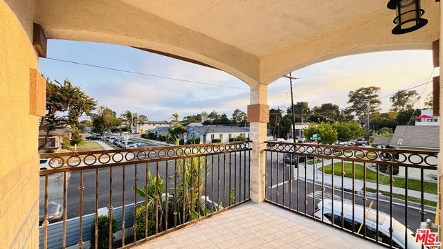 a view of a balcony with city