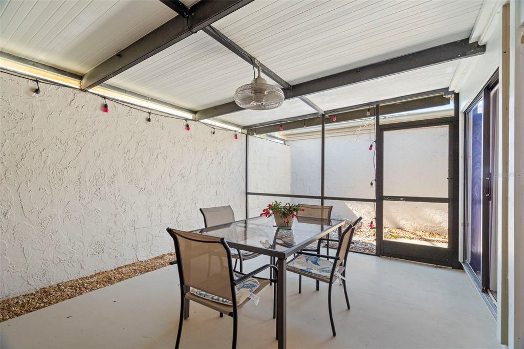 7514 Rocky Point Drive Hudson, FL 34667 - Photo 15 of 38 a dining room with furniture and window
