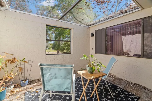 a view of a pathway both side of a house