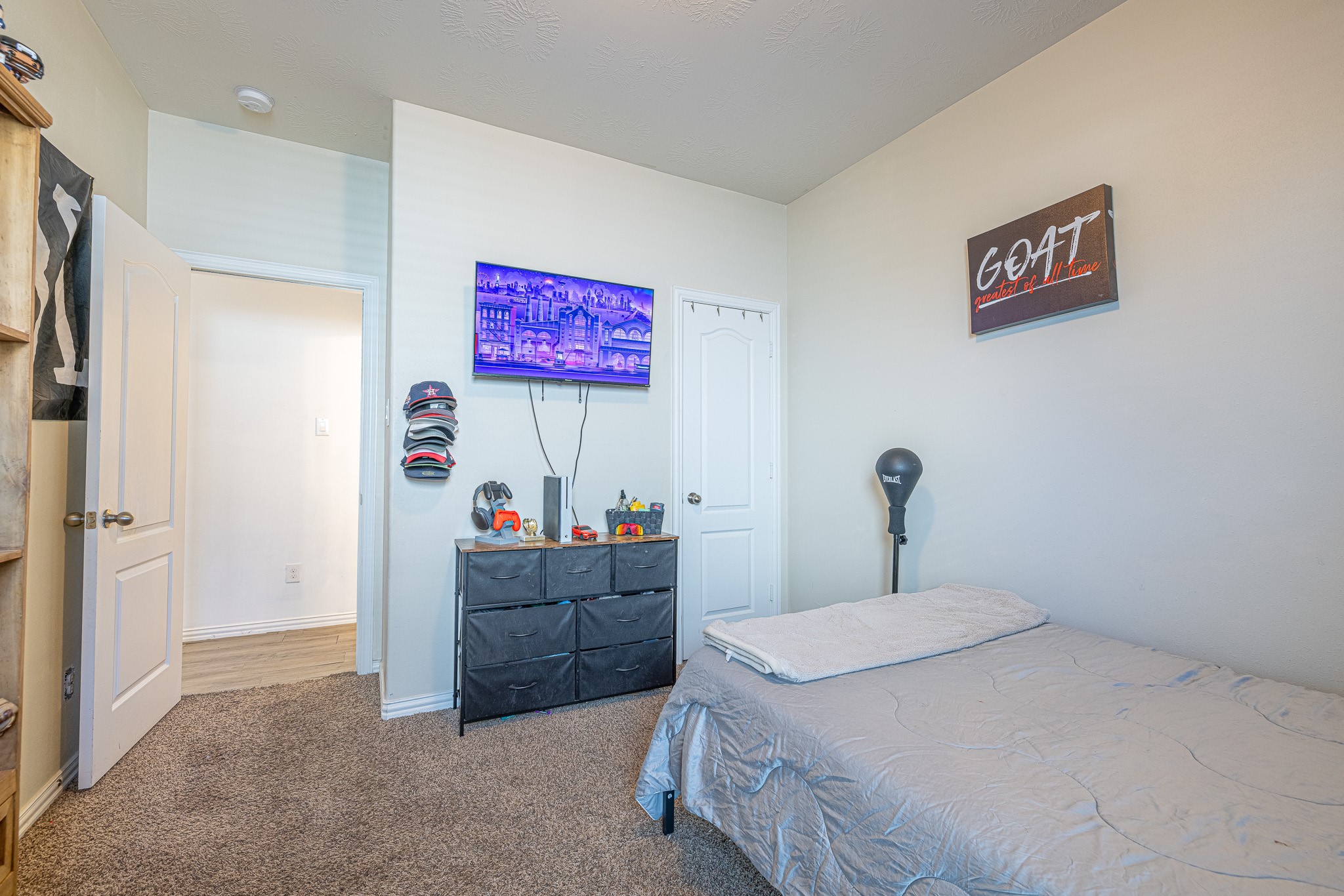 3818 Hunters Trail Baytown, TX 77521 - Photo 26 of 32 a bed room with a bed and a dresser