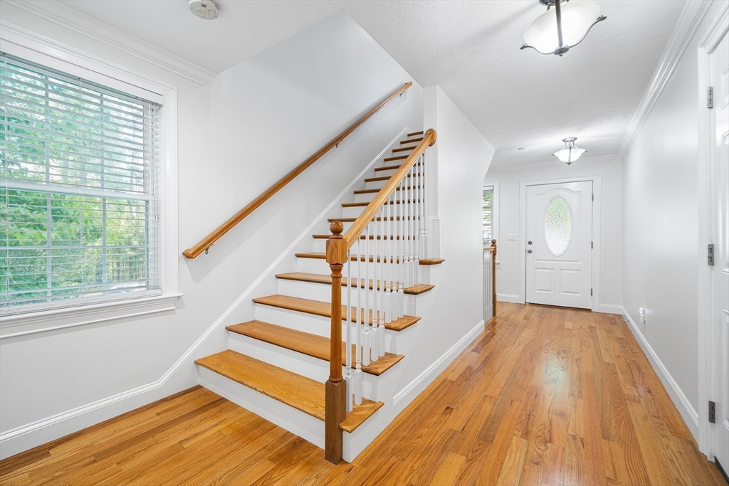 215 Rangeway Road, Unit 31 Billerica, MA 01862 - Photo 14 of 40 a view of entryway with wooden floor and stairs