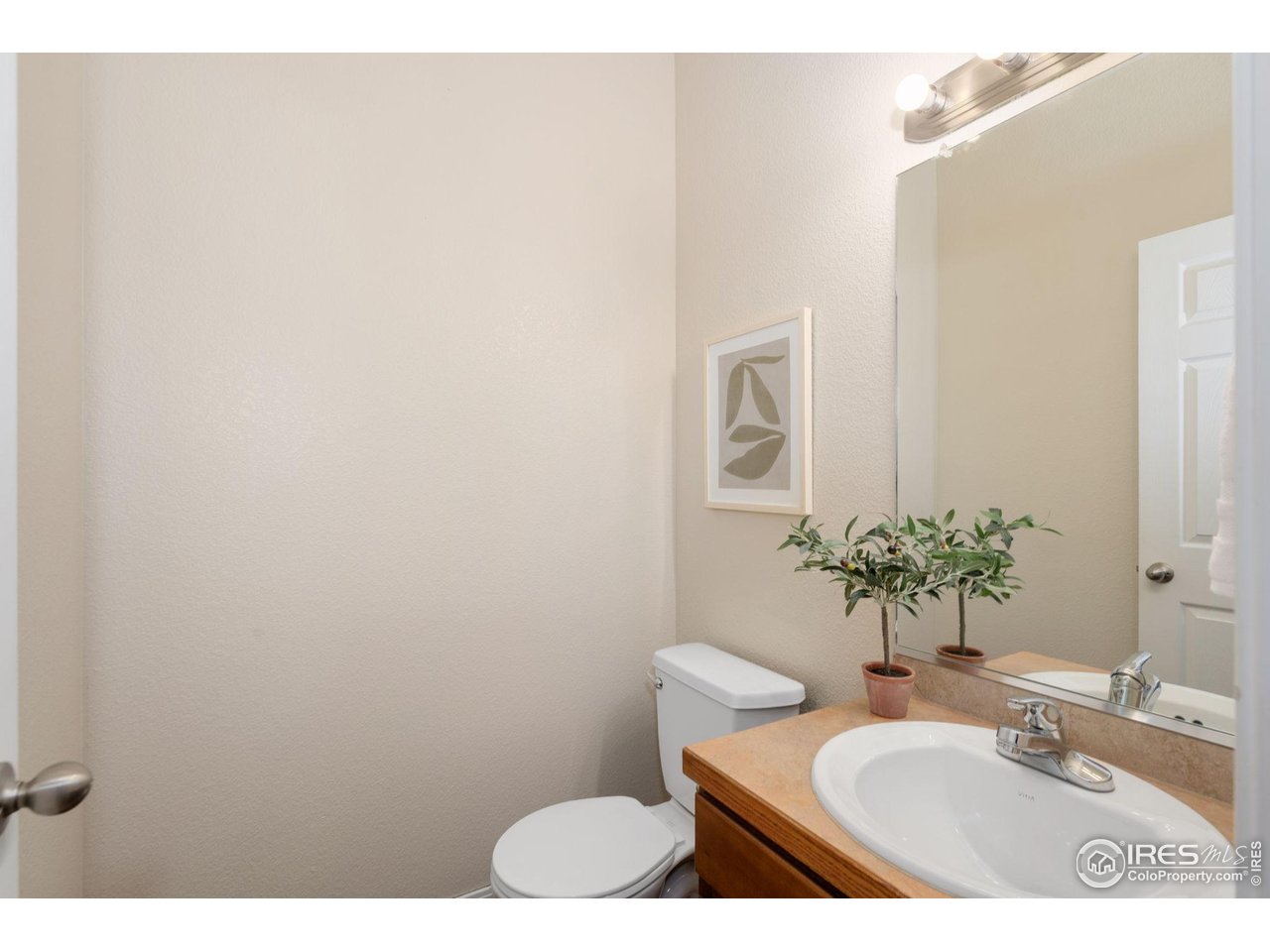 1900 68th Avenue, Unit 4 Greeley, CO 80634 - Photo 12 of 40 a bathroom with a sink and a toilet