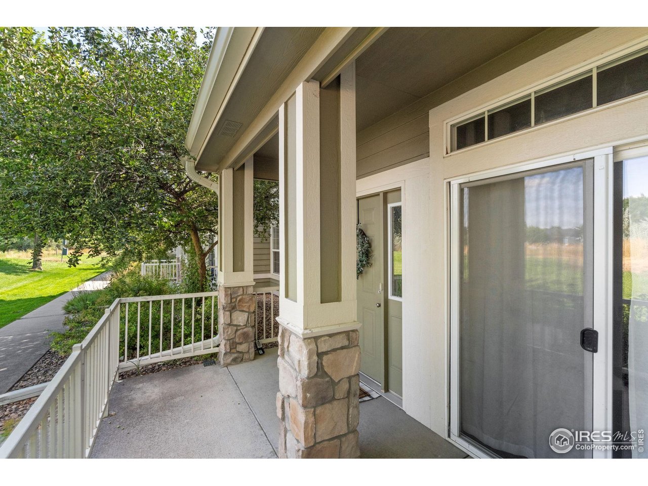 1900 68th Avenue, Unit 4 Greeley, CO 80634 - Photo 35 of 40 a balcony with a outdoor space