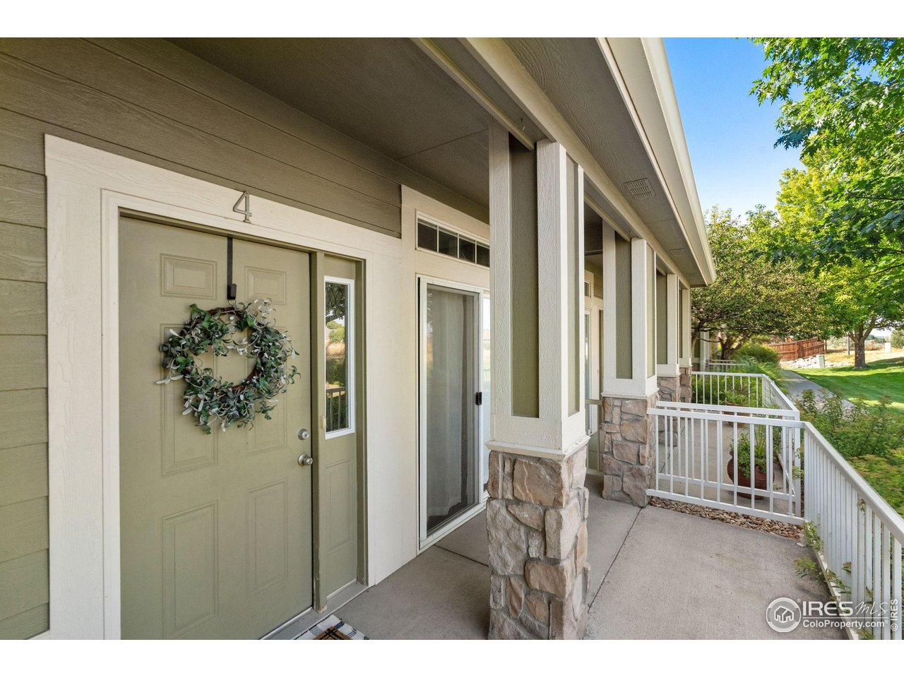 1900 68th Avenue, Unit 4 Greeley, CO 80634 - Photo 39 of 40 a balcony view with a outdoor space
