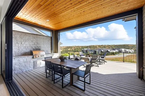a view of swimming pool with outdoor seating