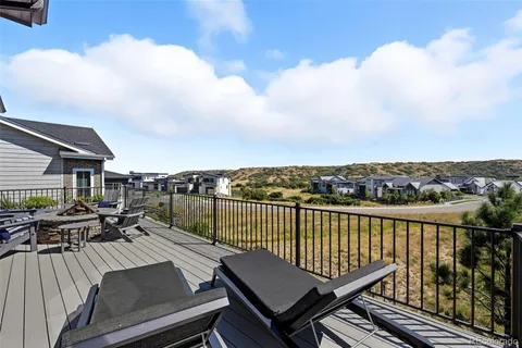 a view of a balcony with city view