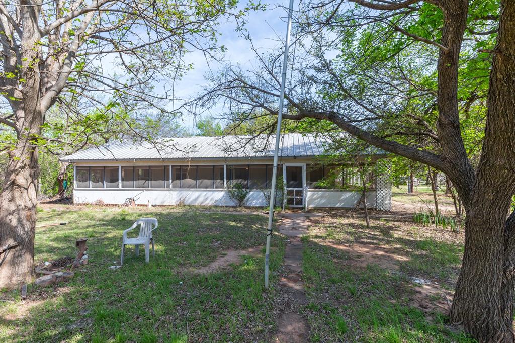 749 Cedar Street Buffalo Gap, TX 79508 - Photo 1 of 30 a view of house with a yard