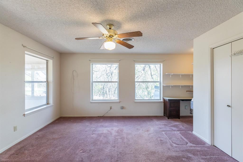 749 Cedar Street Buffalo Gap, TX 79508 - Photo 15 of 30 a view of an empty room with a window