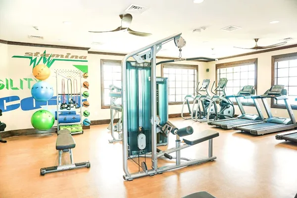 a view of a living room and bedroom