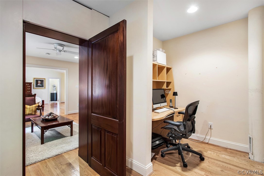 233 Ross Road Henrico, VA 23229 - Photo 17 of 48 a view of a workspace with furniture and wooden floor