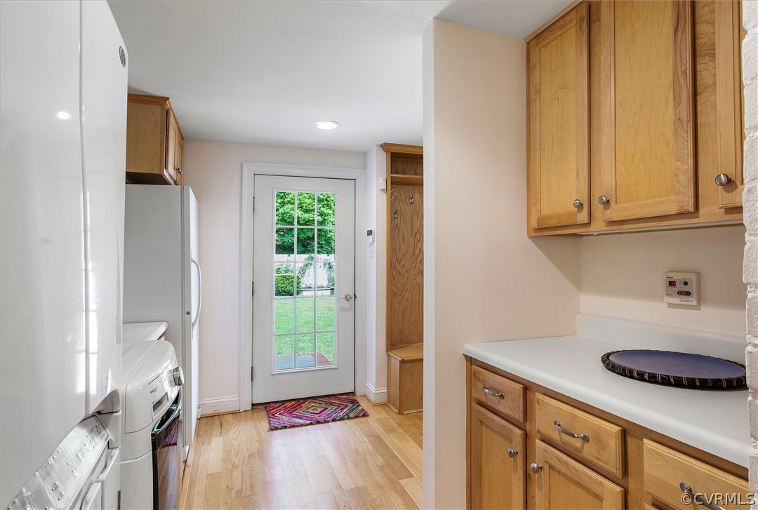 233 Ross Road Henrico, VA 23229 - Photo 30 of 48 a kitchen with stainless steel appliances granite countertop a refrigerator and a sink