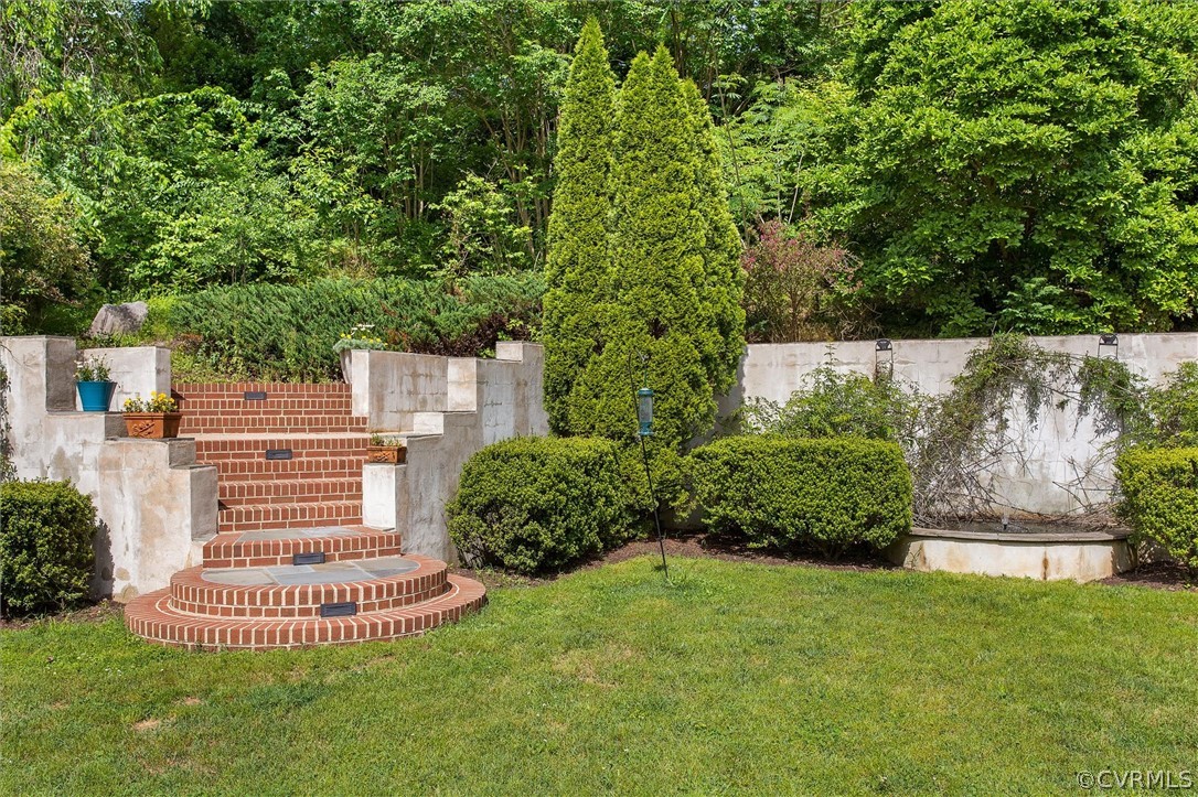 233 Ross Road Henrico, VA 23229 - Photo 42 of 48 a view of a house with a yard and sitting area