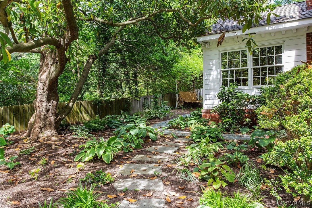 233 Ross Road Henrico, VA 23229 - Photo 45 of 48 a view of a garden with a house