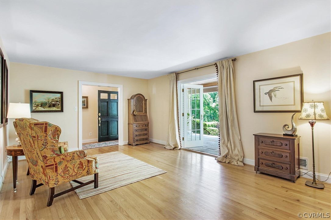 233 Ross Road Henrico, VA 23229 - Photo 5 of 48 a living room with furniture and wooden floor