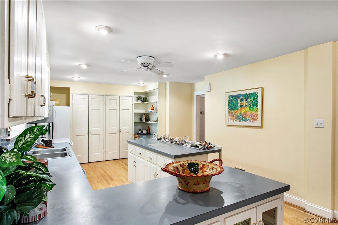 233 Ross Road Henrico, VA 23229 - Photo 9 of 48 a kitchen with stainless steel appliances a white table chairs
