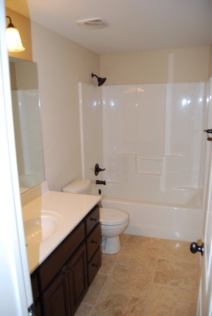 118 Laurel Ridge Forsyth, GA 31029 - Photo 21 of 21 a bathroom with a sink a toilet and shower