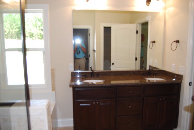 118 Laurel Ridge Forsyth, GA 31029 - Photo 10 of 21 a bathroom with a sink and a mirror