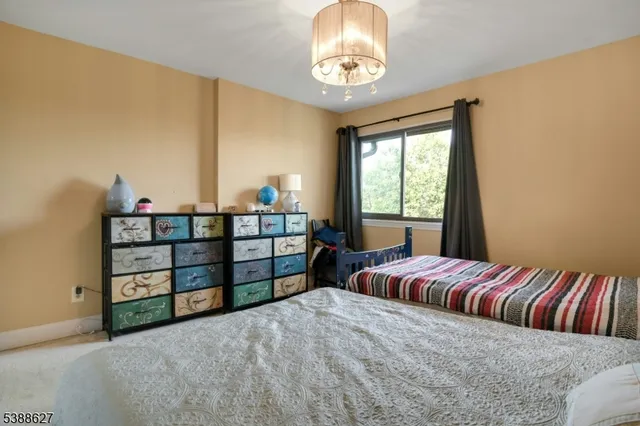 a view of a bedroom with furniture and staircase