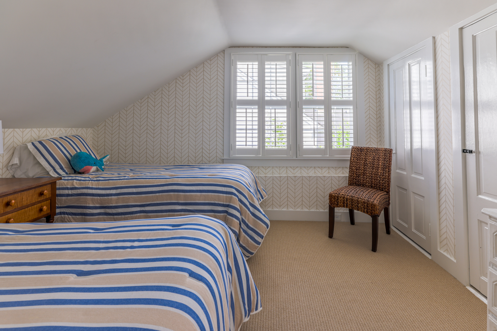 12 Hussey Street Nantucket, MA 02554 - Photo 29 of 47 a bedroom with a bed and a window