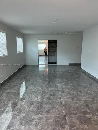 an empty room with window