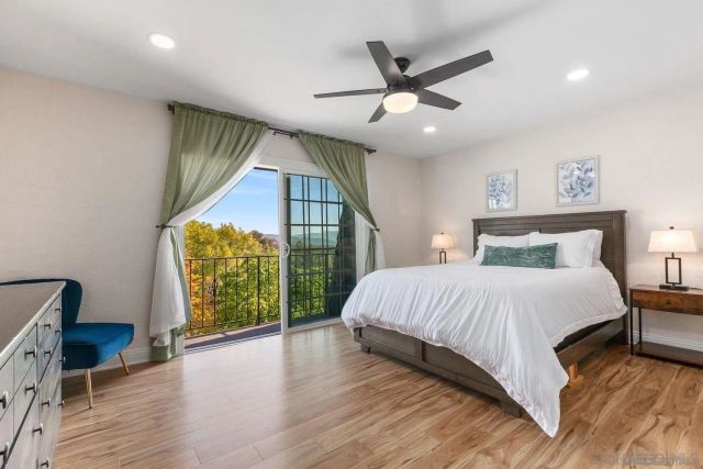 a view of a livingroom with furniture and wooden floor