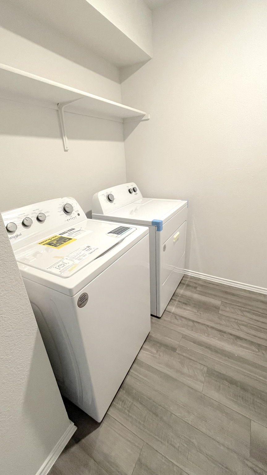 108 Pivot Drive Taylor, TX 76574 - Photo 20 of 30 a utility room with dryer and washer