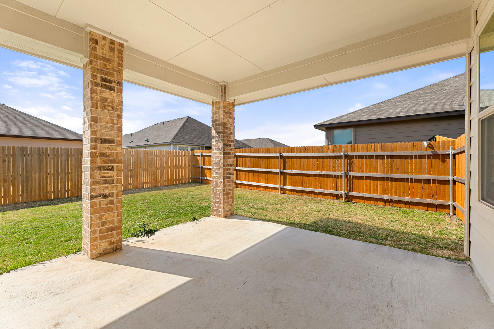 108 Pivot Drive Taylor, TX 76574 - Photo 26 of 30 a view of a back yard with wooden fence