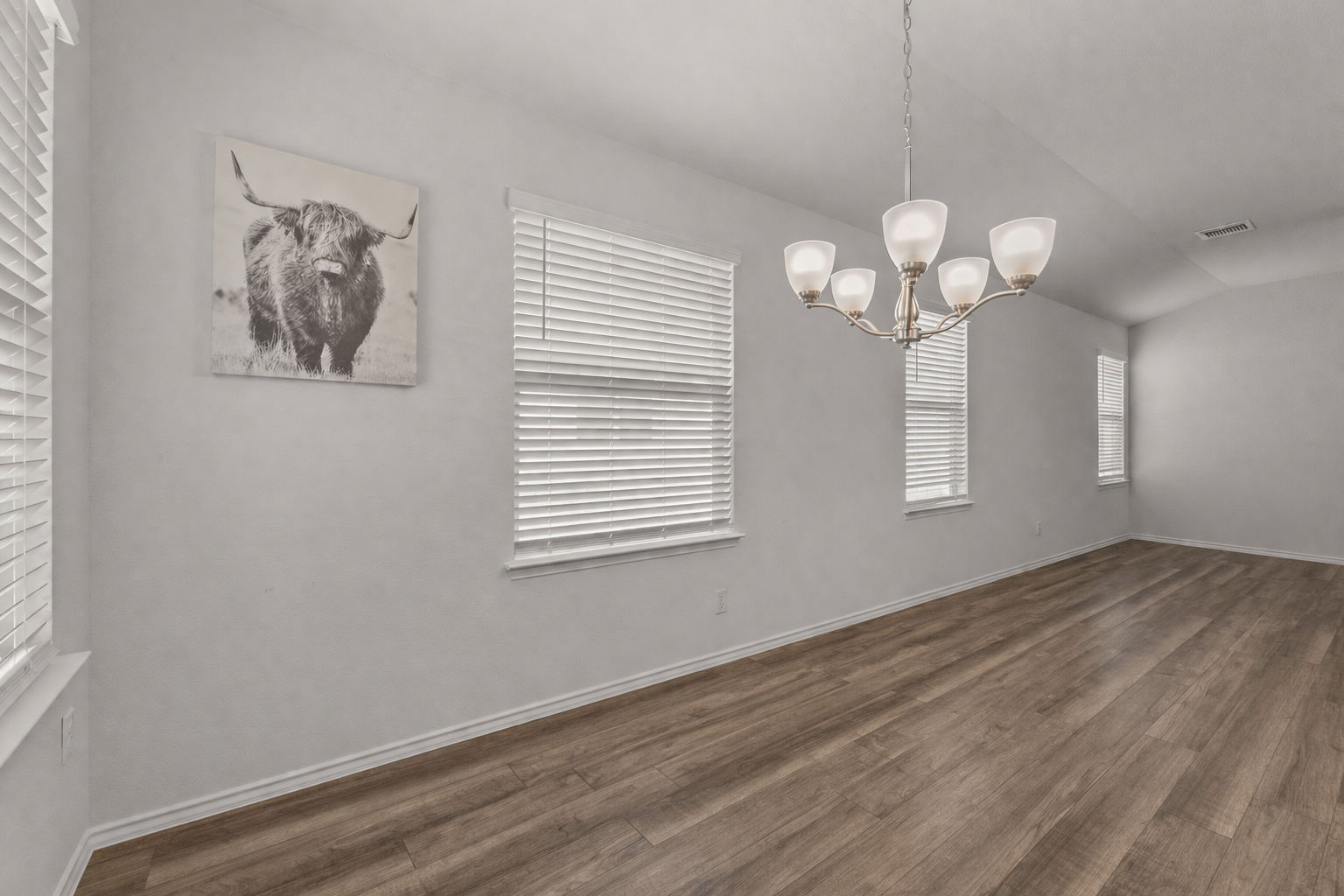 108 Pivot Drive Taylor, TX 76574 - Photo 8 of 30 wooden floor in an empty room with a window