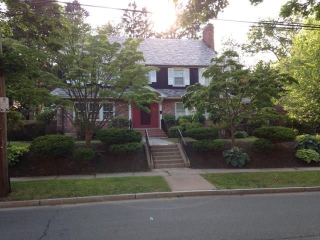 165 Terry Road Hartford, CT 06105 - Photo 1 of 1 a front view of a house with a yard