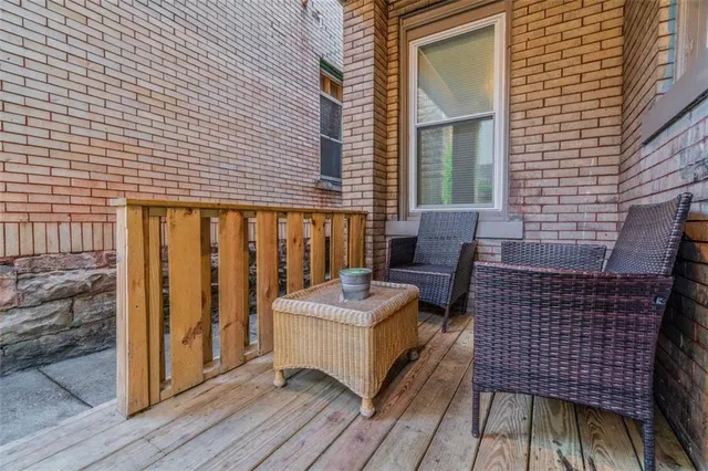 a view of backyard with outdoor seating