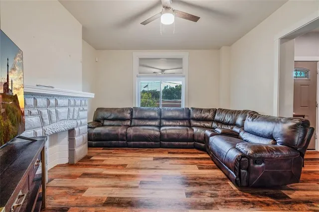 a living room with a couch and a flat screen tv