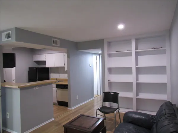 a room with furniture and a window