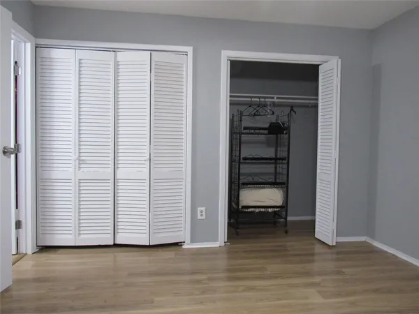 a view of a room with racks on the wall