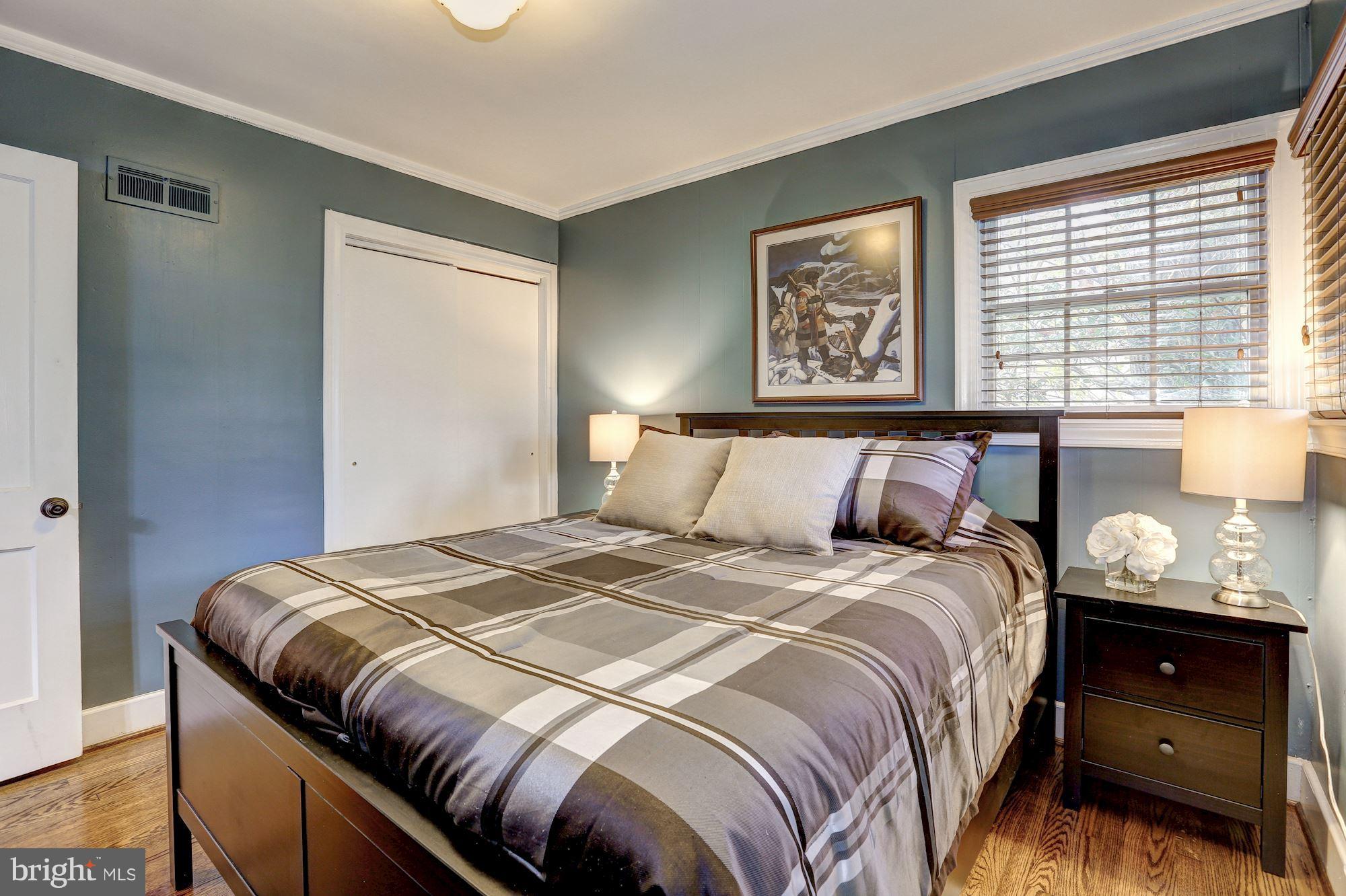 10205 Procter Street Silver Spring, MD 20901 - Photo 21 of 38 a bedroom with a bed and a window