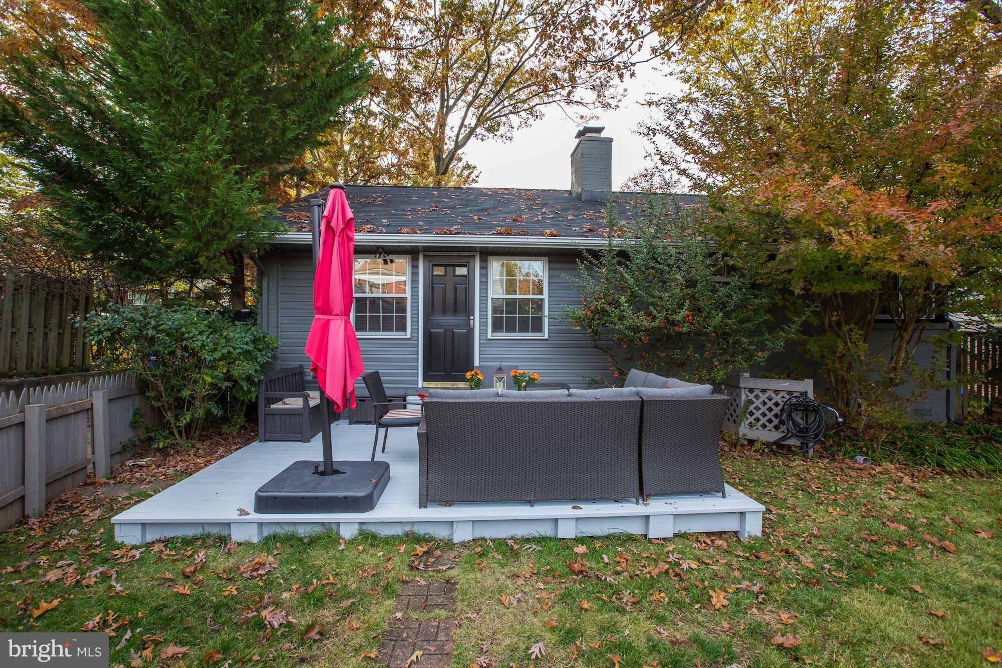 10205 Procter Street Silver Spring, MD 20901 - Photo 30 of 38 a view of house with backyard and sitting area