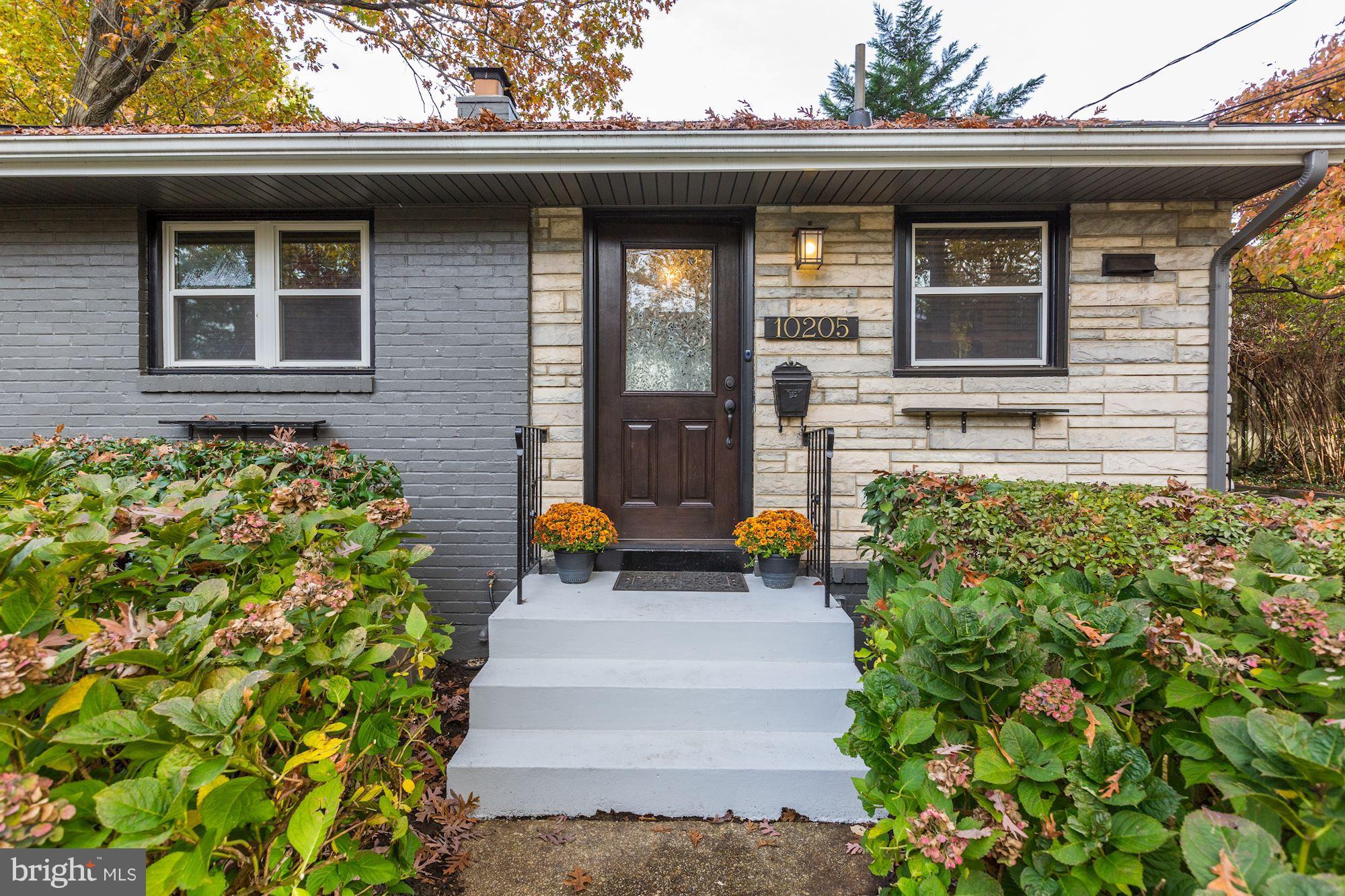 10205 Procter Street Silver Spring, MD 20901 - Photo 38 of 38 a front view of a house with outdoor seating