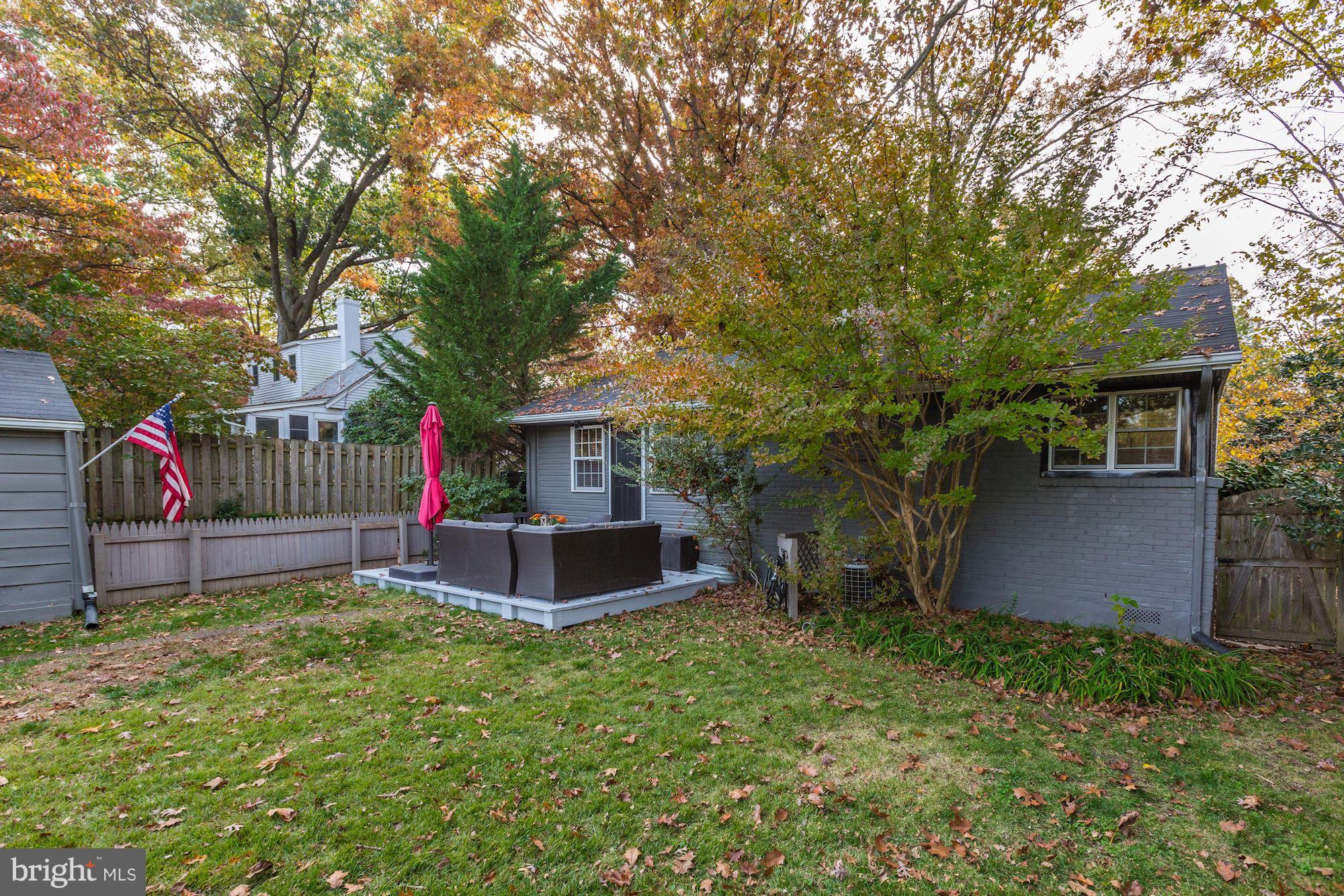 10205 Procter Street Silver Spring, MD 20901 - Photo 6 of 38 a front view of house with yard and outdoor seating