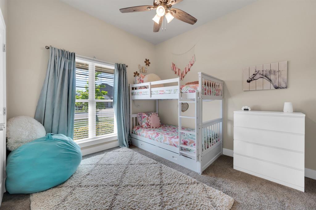 1313 Ridgeview Drive Weatherford, TX 76086 - Photo 16 of 34 Carpeted bedroom featuring ceiling fan and baseboards