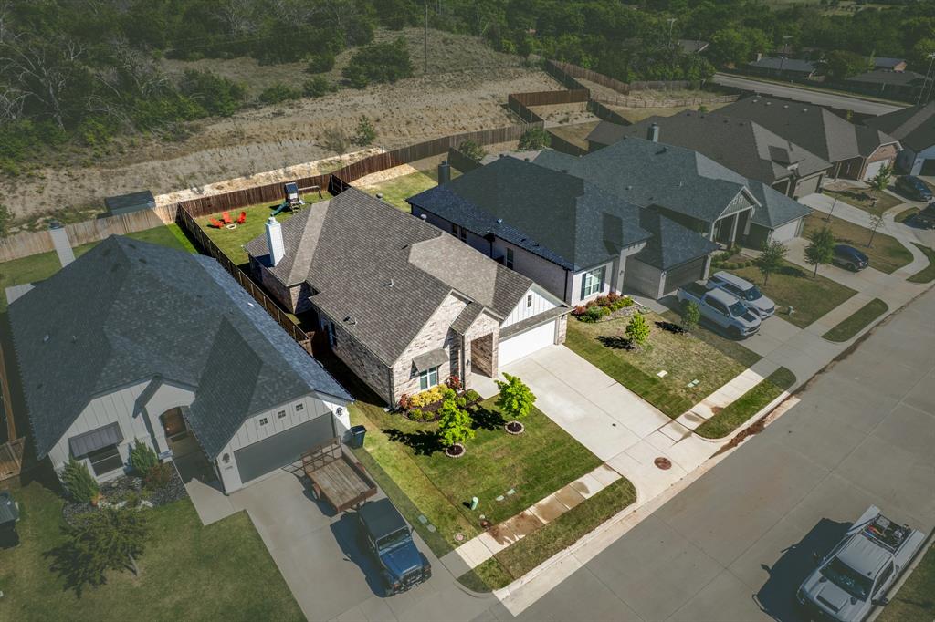 1313 Ridgeview Drive Weatherford, TX 76086 - Photo 2 of 34 Aerial perspective of suburban area