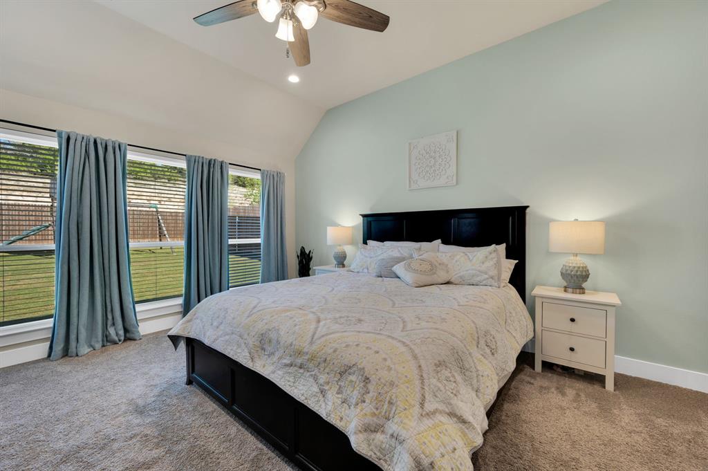 1313 Ridgeview Drive Weatherford, TX 76086 - Photo 21 of 34 Carpeted bedroom featuring lofted ceiling, ceiling fan, and recessed lighting