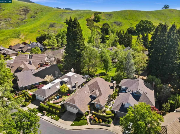 an aerial view of residential house with an outdoor space