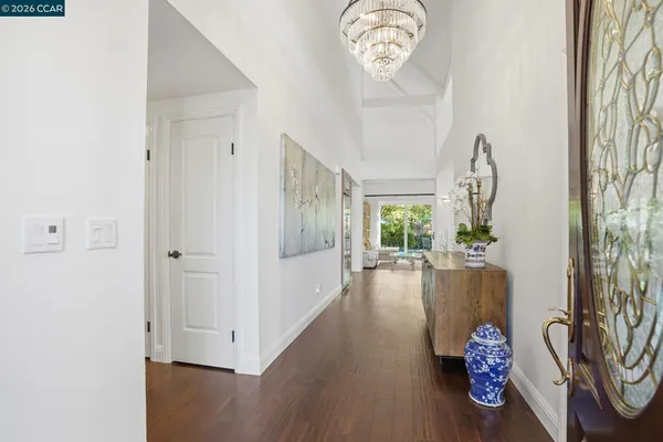 a view of entryway with wooden floor
